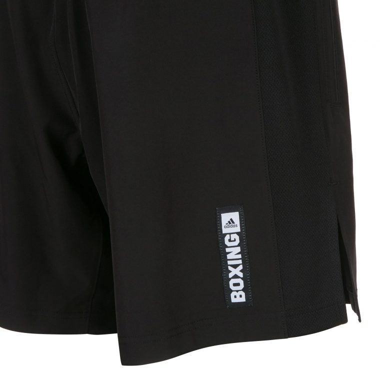 Close-up of Adidas Boxwear tech shorts in black color.