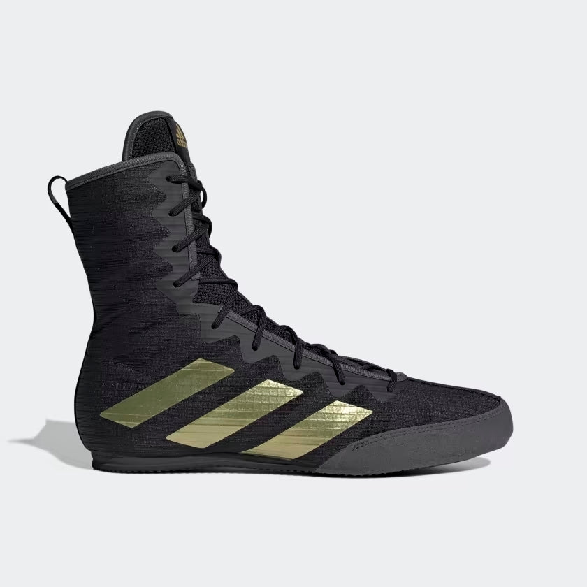 Black and gold high top boxing shoe with recycled content.