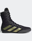 Black and gold high top boxing shoe with recycled content.