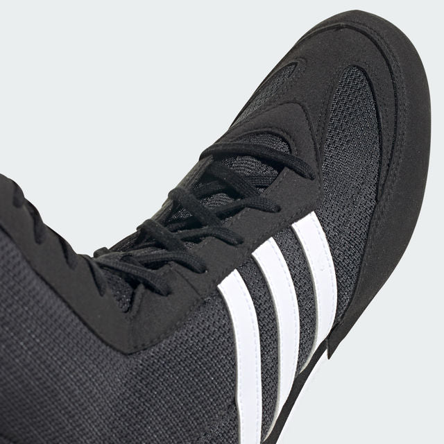 Close up of adidas BOX HOG II black and white boxing shoe.