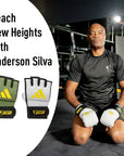 Man wearing Adidas x Anderson Silva fingerless grappling gloves.