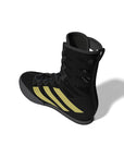 Black and yellow boxing shoe in Core Black and Gold Metallic.