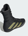 Black and gold high top boxing shoe for men and women.