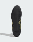 Black shoe with gold stripes designed for boxing.