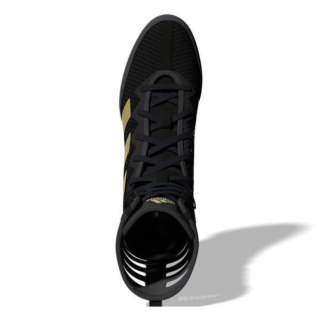 Black boxing shoe with yellow accents.