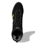 Black boxing shoe with yellow accents.