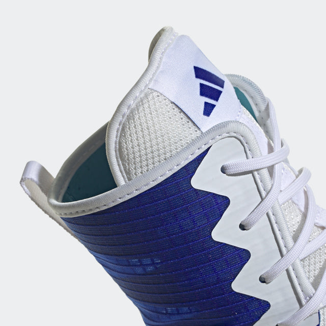 Close-up of blue and white boxing shoe in Lucid Blue and Cloud White.