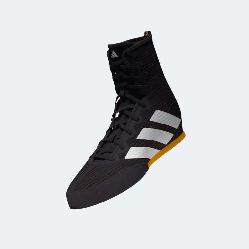 Black shoe with white stripes, ideal for boxing.