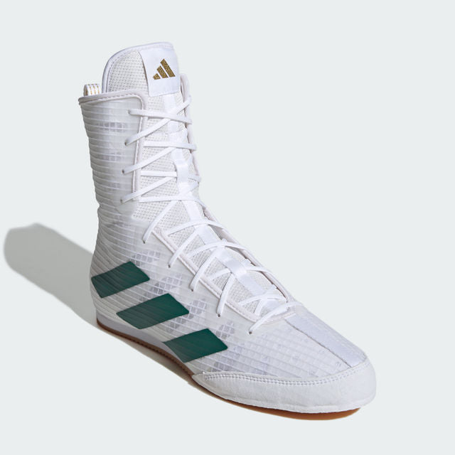 White boxing shoe with green stripes on a light gray background