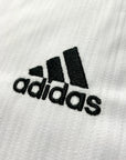 Close up of a logo on a uniform.