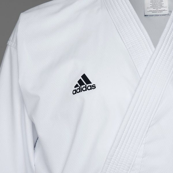 White karate uniform with black logo.