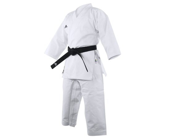 White karate uniform with black belt.