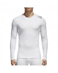 Man in white adidas rashguard, XS size, for boxing.