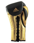 Gold and black adidas boxing glove, 10 oz.