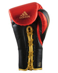 Boxing glove with gold lace from adidas Speed Tilt 750 series.