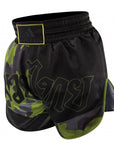 Black and green Thai boxing shorts.