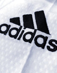 Close up of a logo on adidas Taekwondo Eco Fighter Uniform.