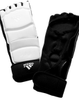 Black WTF foot protectors on a black background.