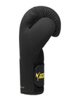 Adidas x Anderson Silva black boxing glove with yellow logo, 12 oz size.