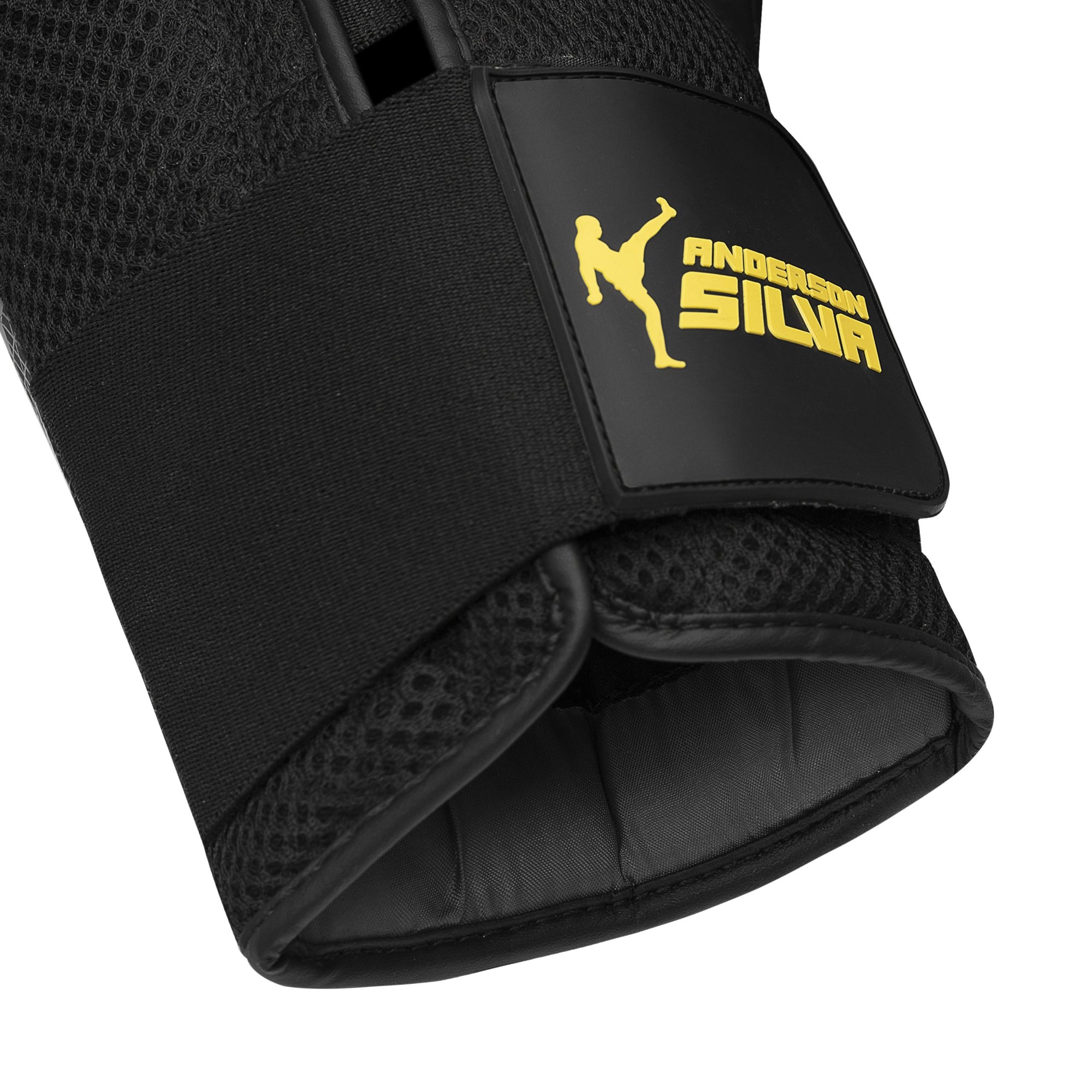 Black Adidas boxing glove with yellow logo.