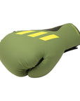 Green Adidas boxing glove with yellow stripes.