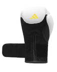 Black and white boxing glove, side view from Adidas x Anderson Silva.