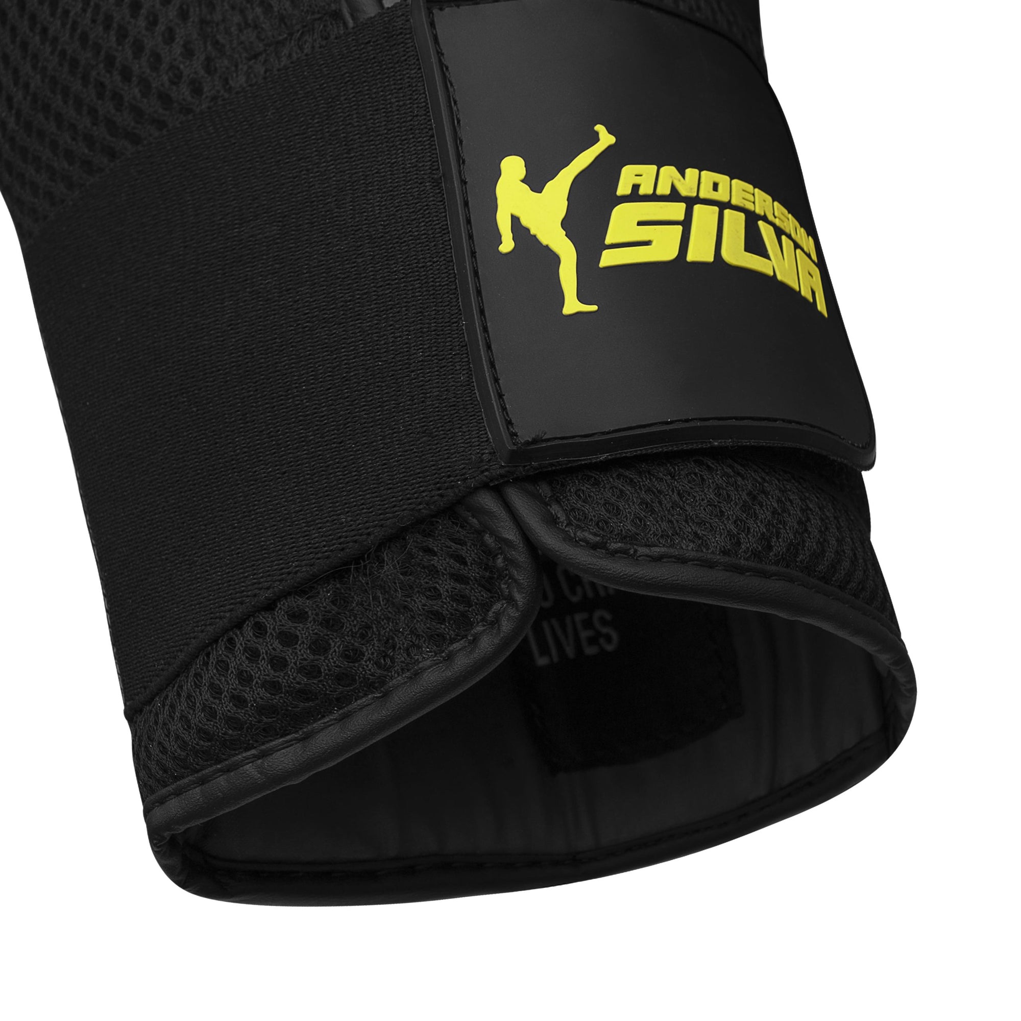 Black boxing glove with yellow logo from Adidas x Anderson Silva collection.