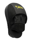 Black Adidas boxing glove with prominent yellow text.