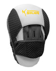 White and black Adidas boxing glove for training.