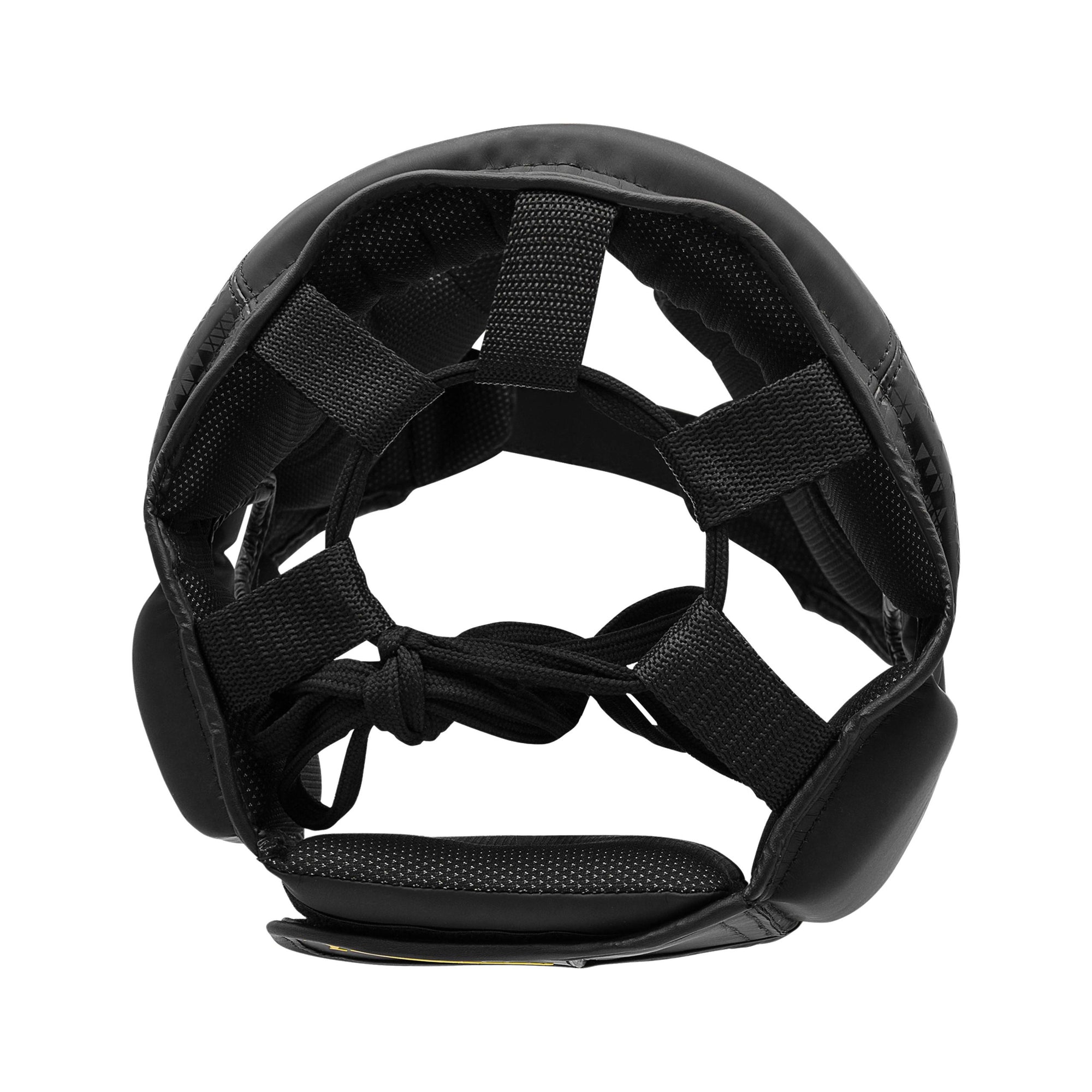 Black head guard with straps for boxing protection.