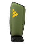 Green and black Adidas x Anderson Silva bag for shin and step protector.