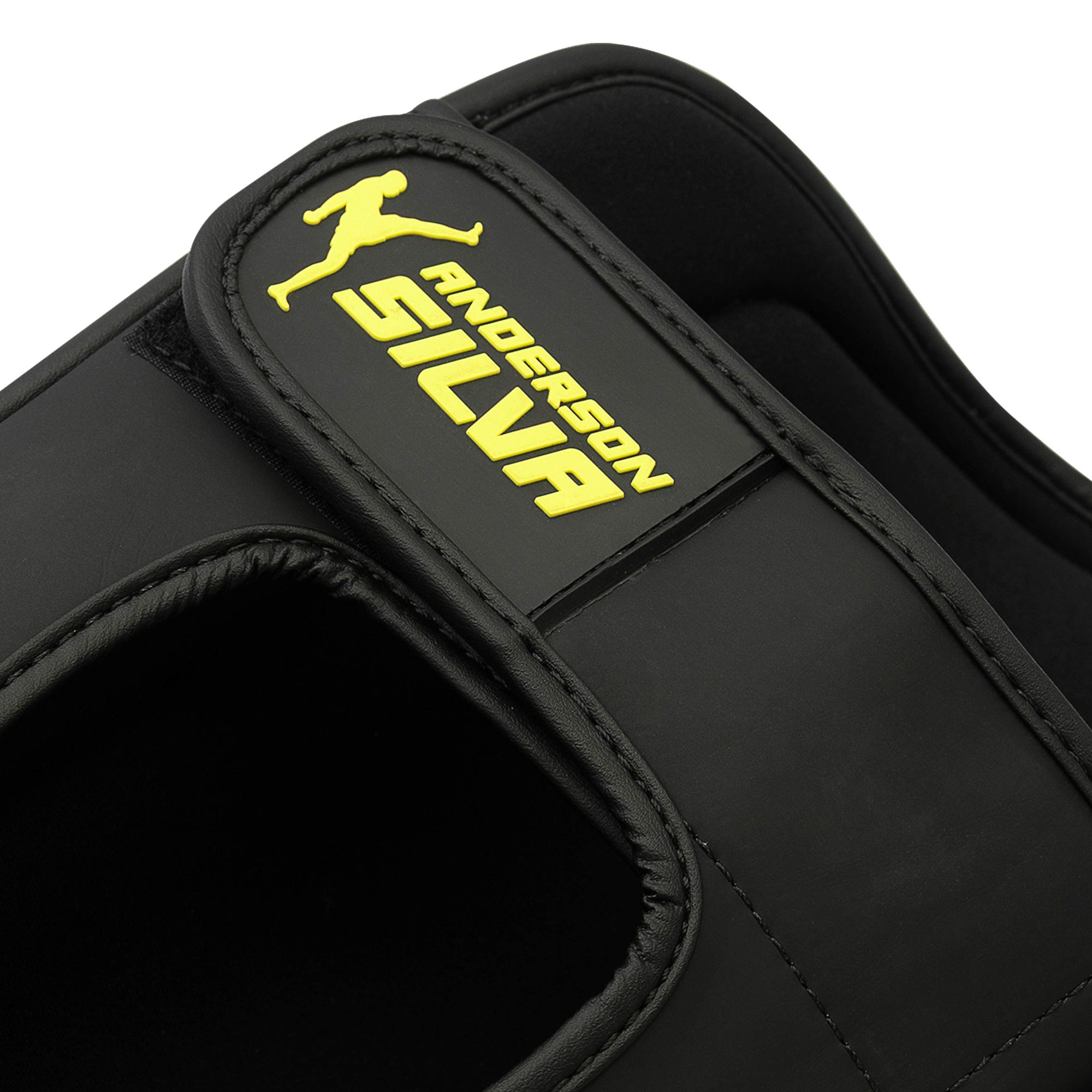 Black and yellow bag with logo for boxing gear.