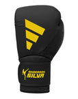 Black boxing glove with yellow logo, Adidas x Anderson Silva.