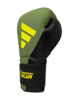 Green and black boxing glove, Adidas x Anderson Silva, 14 oz size.