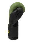 Green and black boxing glove, Adidas x Anderson Silva, 10 oz size.