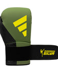 Green and black boxing glove, Adidas x Anderson Silva, 14 oz size.