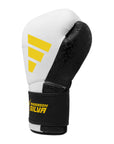 Black and white Adidas x Anderson Silva boxing glove.