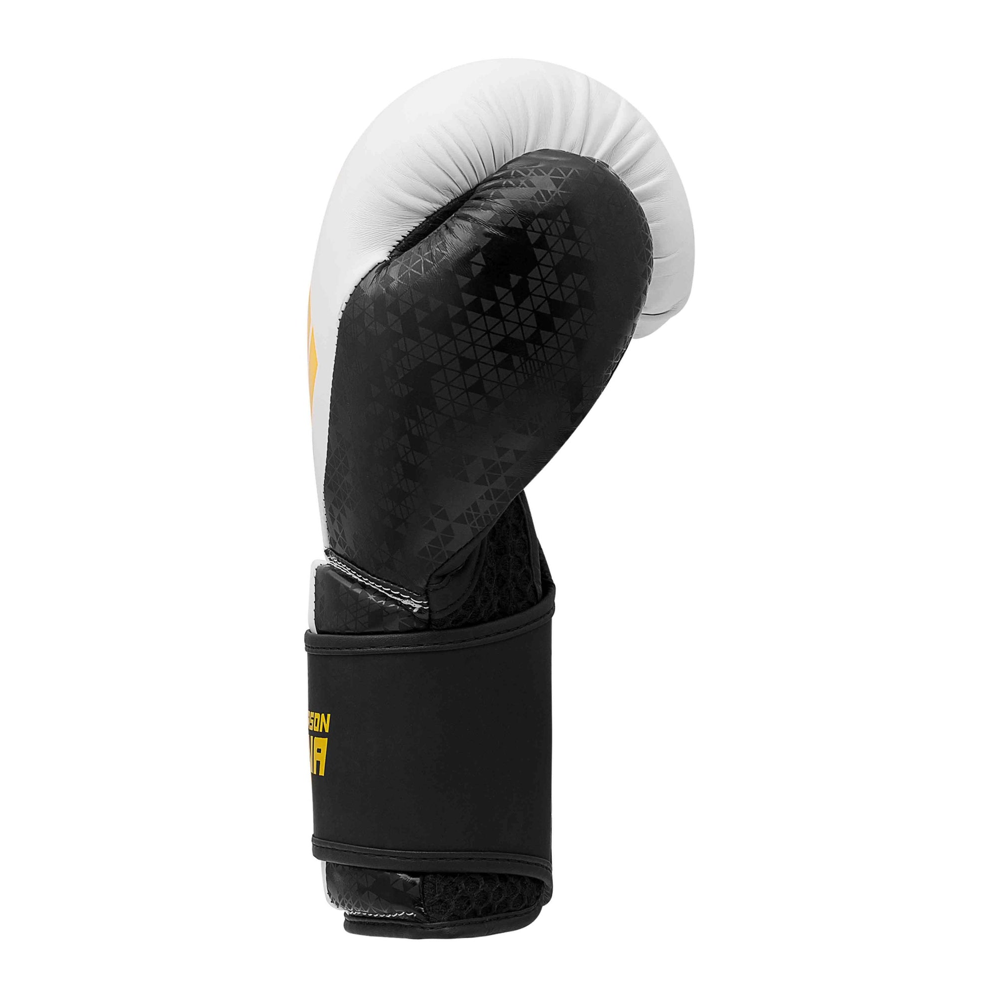 Black and white Adidas x Anderson Silva boxing glove.