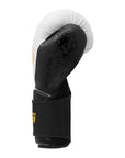 Black and white Adidas x Anderson Silva boxing glove.