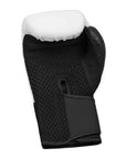 Black and white Adidas x Anderson Silva boxing glove.