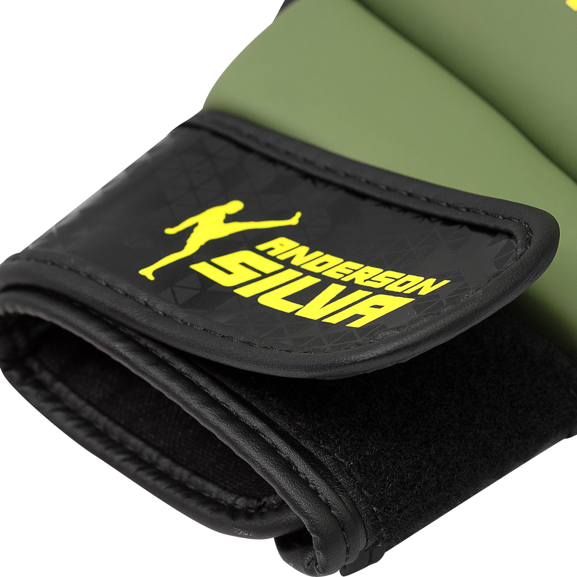 Close-up of Adidas x Anderson Silva training glove in green and yellow.