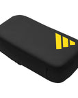 Black case with yellow logo for Adidas x Anderson Silva MMA thigh pad.