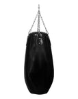 Black punching bag from a chain for boxing training.