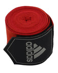 Red and black boxing hand wrap, displayed flat.