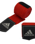 Red and black wrist wraps for boxing, 2.55m length.