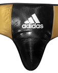 Black and gold Adidas boxing groin guard for XL/XXL size.