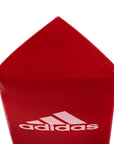 Red adidas corner pad with white text, close-up.