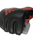 Black and red adidas boxing glove, small size.