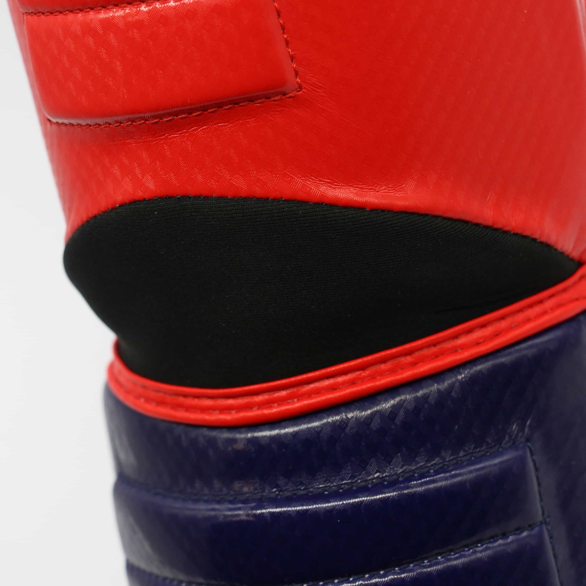 Close-up of red and blue boxing glove.