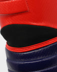 Close-up of red and blue boxing glove.